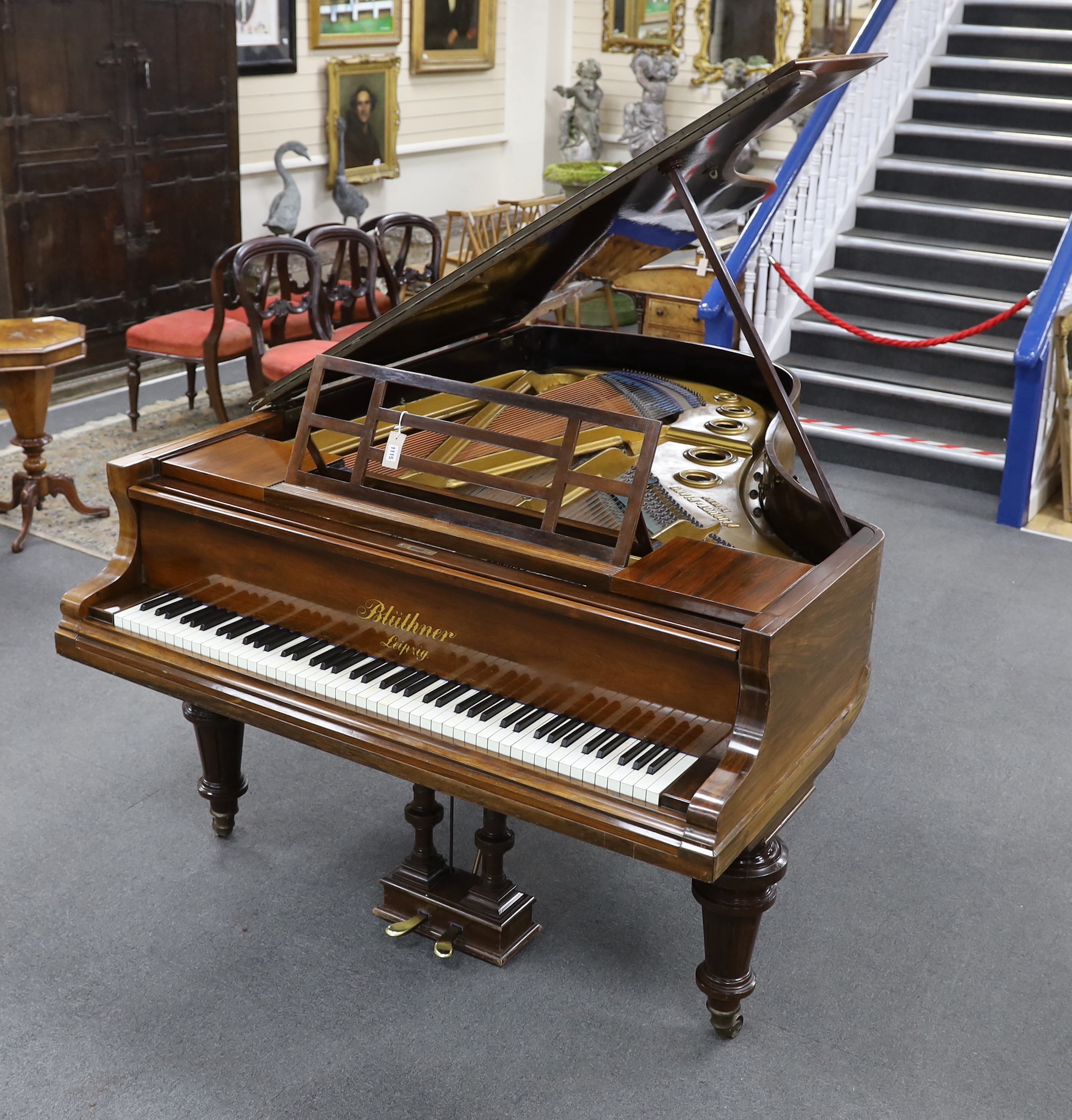 An early 20th century Blüthner rosewood and simulated rosewood Alquot Patent grand piano, Serial No. 72354, width 146cm, length 188cm